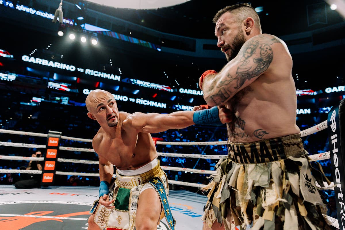 John Garbarino throws a jab during the bout against Mike Richman