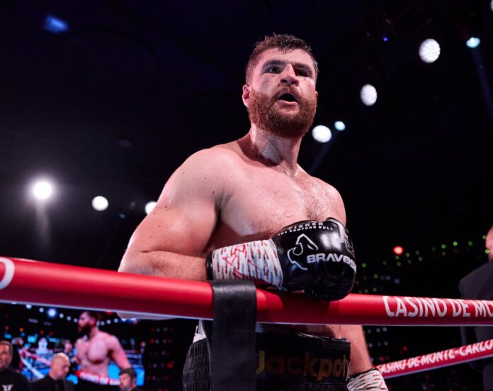 Johnny Fisher celebrates his victory over Ivan Balaz during their bout