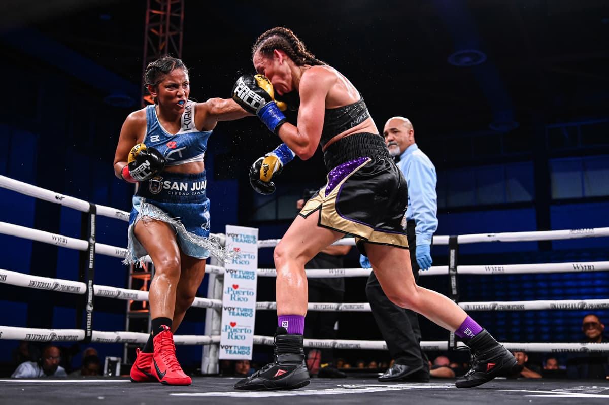 Kiria Tapia throws a punch during her bout against Alba Sanchez