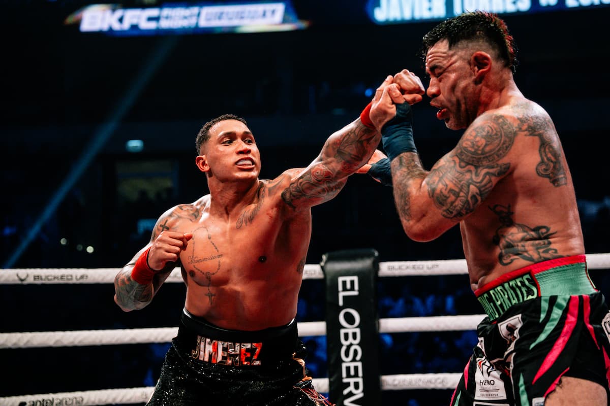 Luis Jimenez throws a jab during his bout against Javier Torres