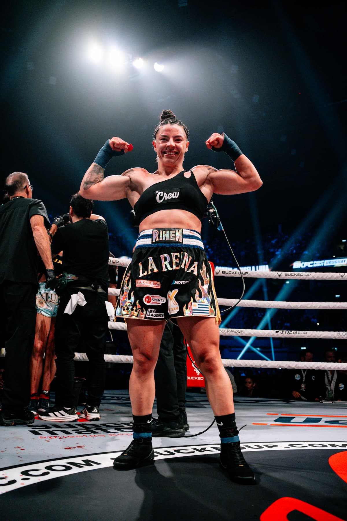 Marilyn Contin celebrates her victory over Gisela Luna