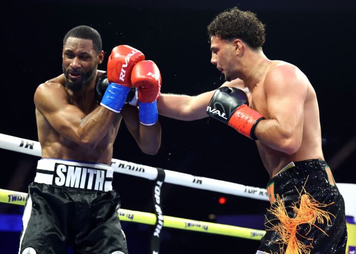Patrick O'Connor lands a punch during his bout against Marcus Smith