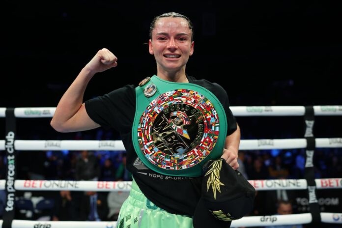 Skye Nicolson poses with her belt after her victory