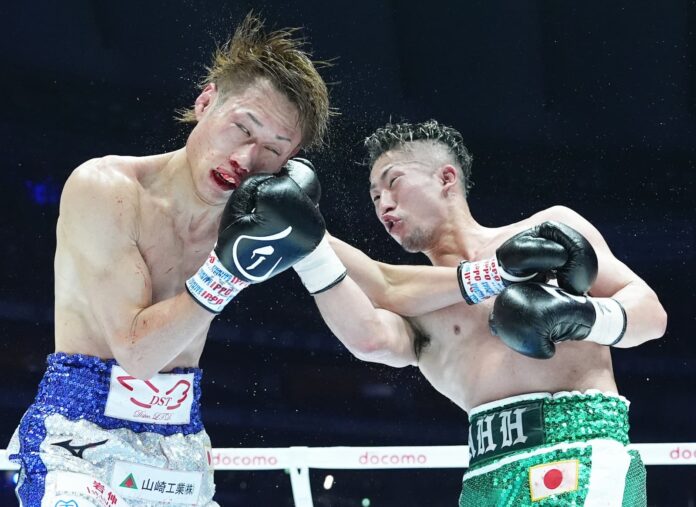 Takuma Inoue lands an uppercut during his bout against Sho Ishida