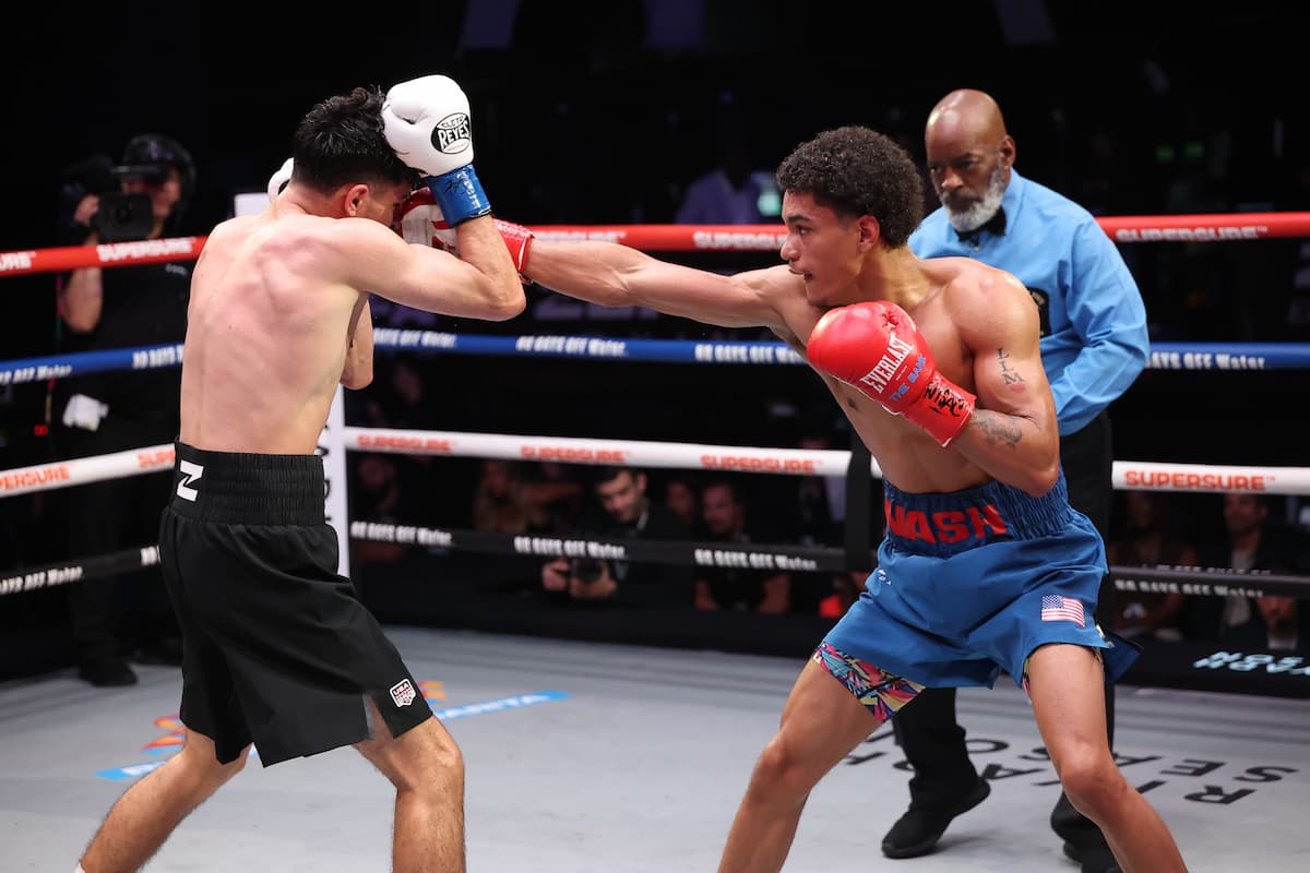 Troy Nash lands a punch during his bout against Ethan Perez