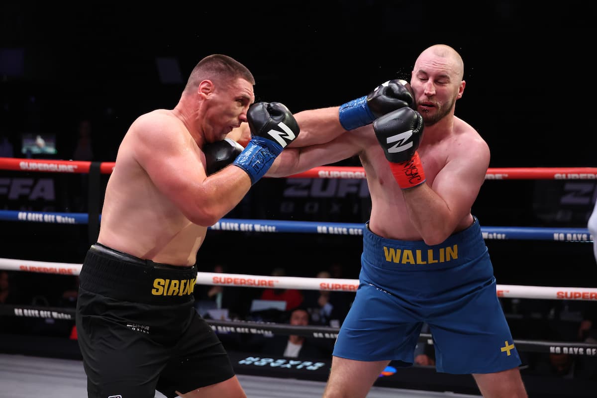 Vladyslav Sirenko lands a jab during his bout against Otto Wallin