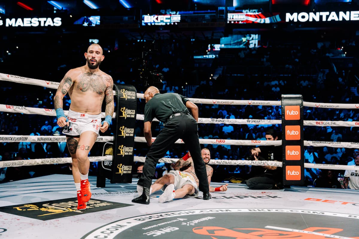 Zedekiah Montanez walks off while Matt Maestas is on the ground during their bout