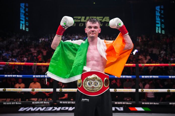 Aaron McKenna poses with his championship belt after his victory over Etinosa Oliha at Zuffa Boxing 10