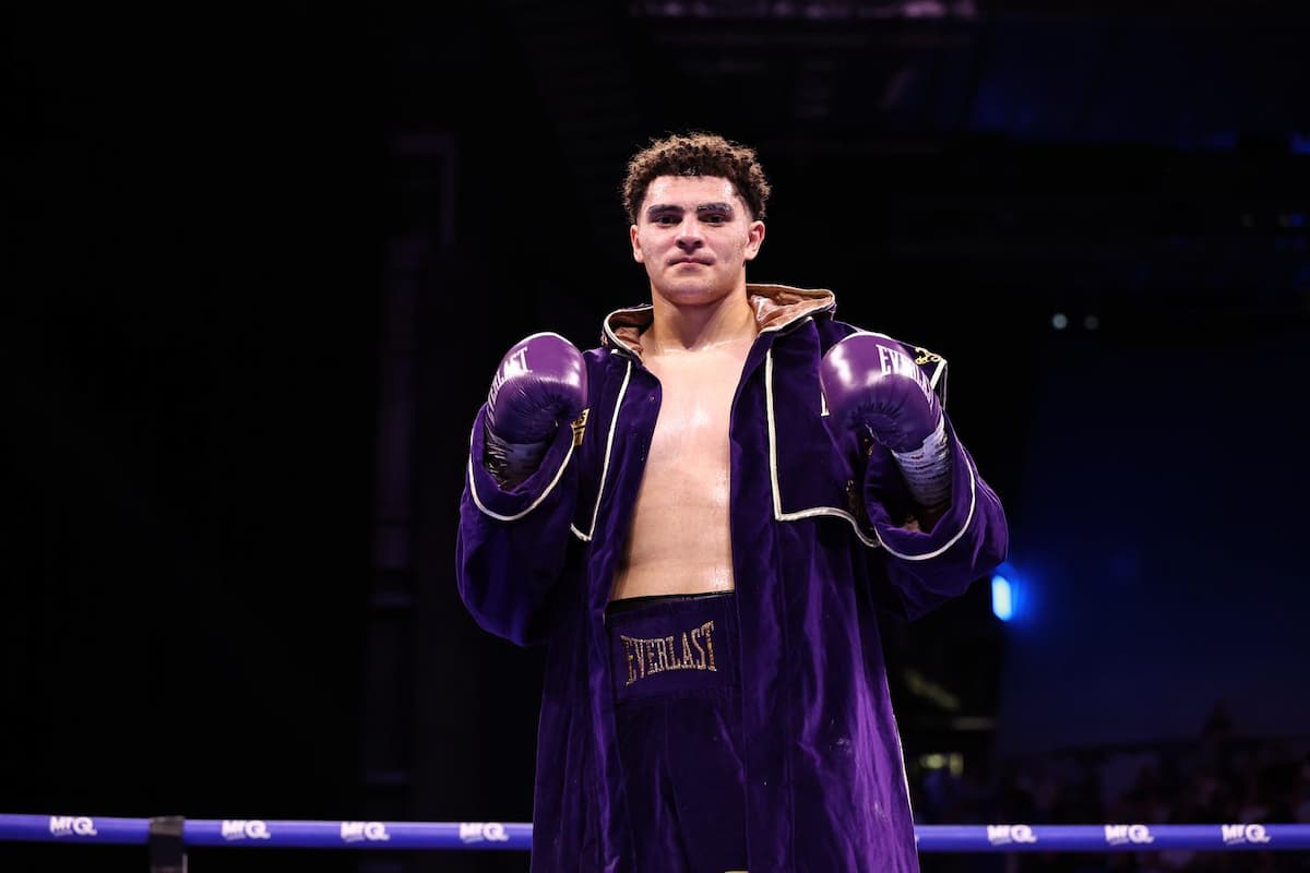 Adam Olaniyan celebrates his victory over Deepak Pathak
