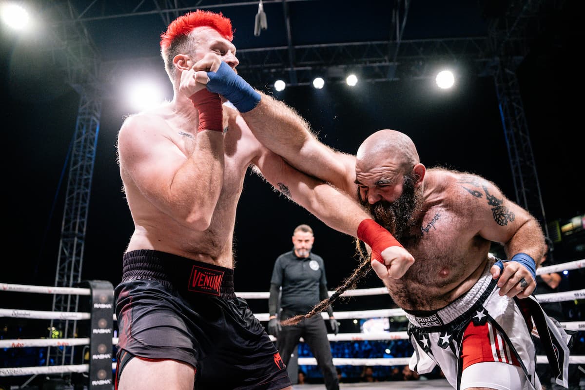 Bear Hill throws a punch during his bout against Brady Meister