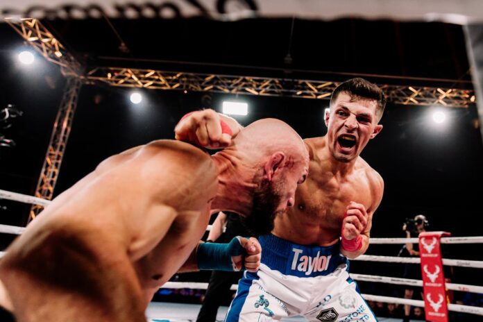 Bradley Taylor lands a punch during his bout against Lewis Garside