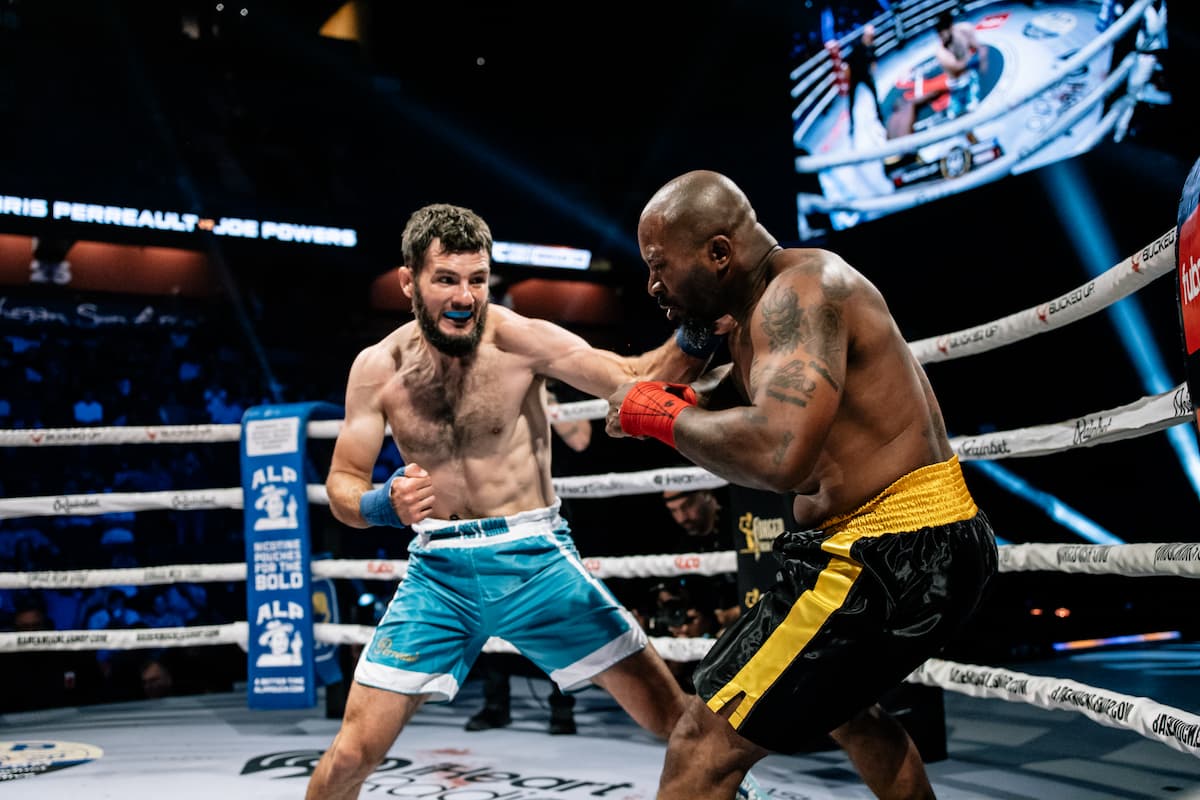 Chris Perreault lands a punch during his bout against Joe Powers