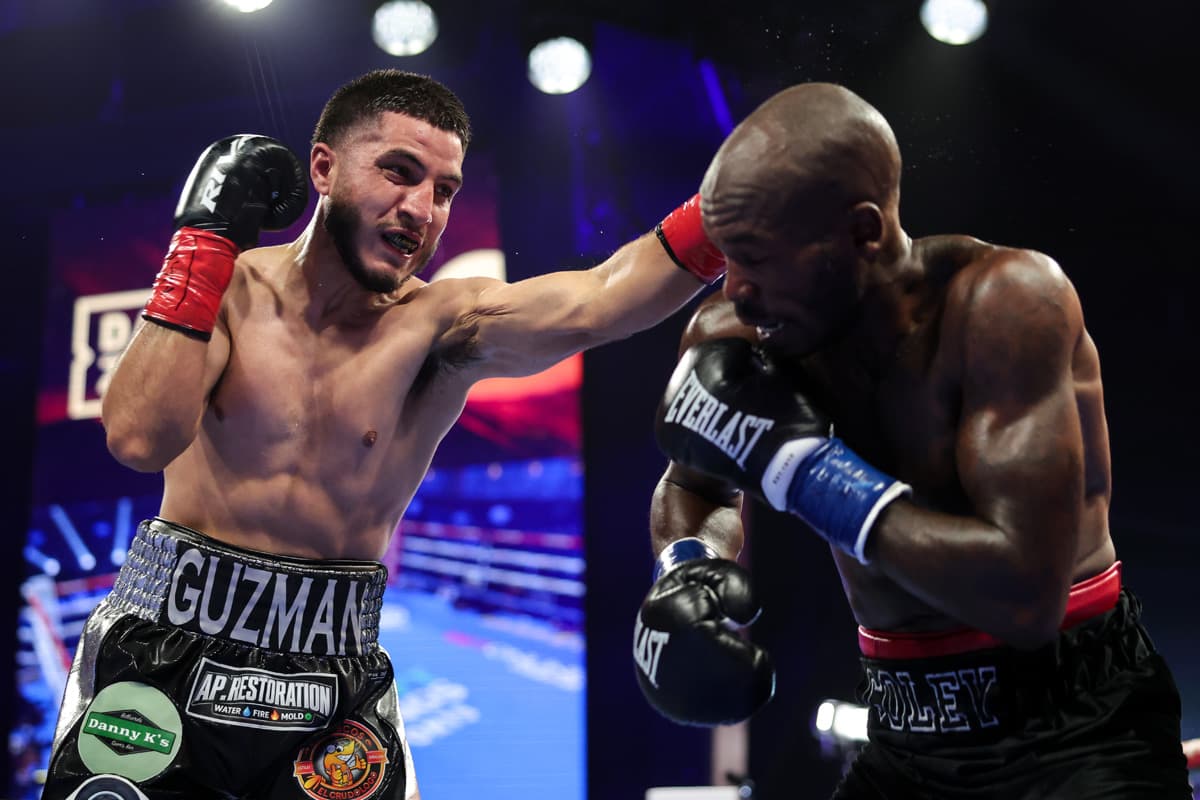 Fabian Guzman lands a jab during his bout against Aaron Coley