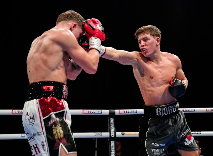 Giorgio Visioli lands a punch during his bout against Joe Howarth
