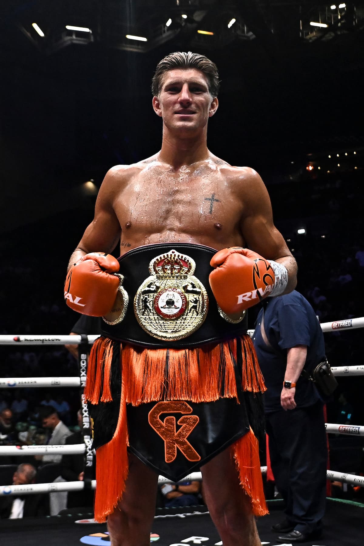 Gradus Kraus poses with his championship belt after his victory over Sean Hemphill