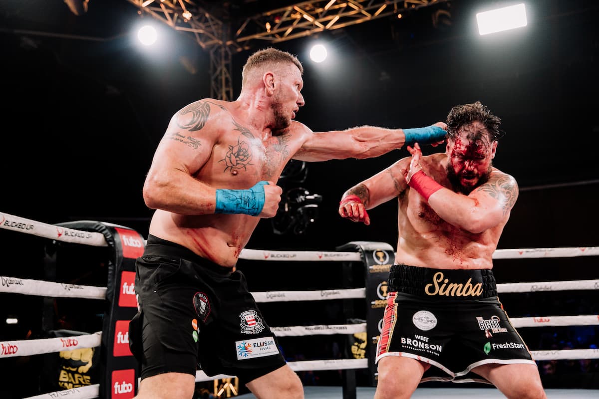 James Walker lands a jab during his bout against Barry Boyle