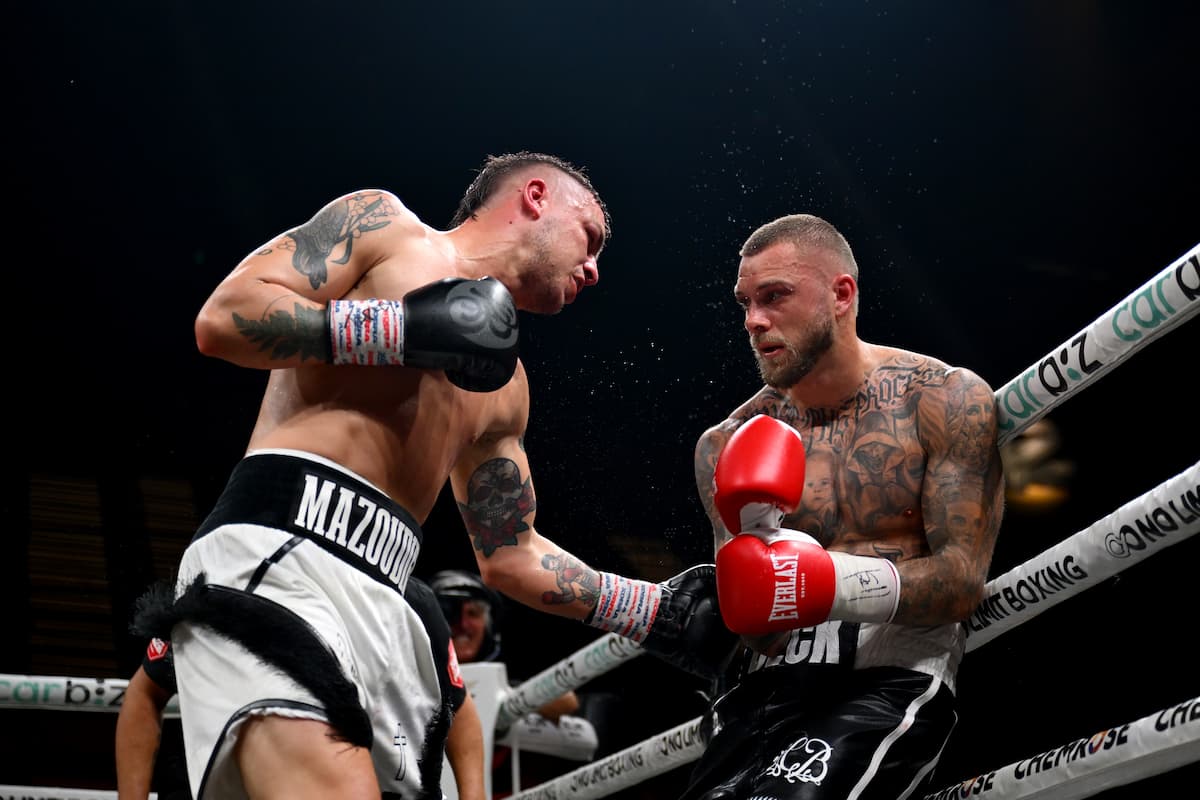 Koen Mazoudier lands a body punch during his bout against Sam Beck
