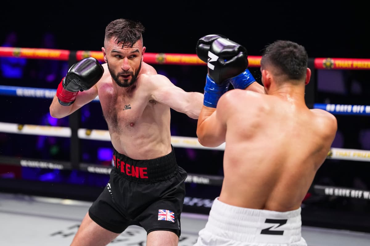 Louis Greene throws a jab during his bout against Daniel Buciuc