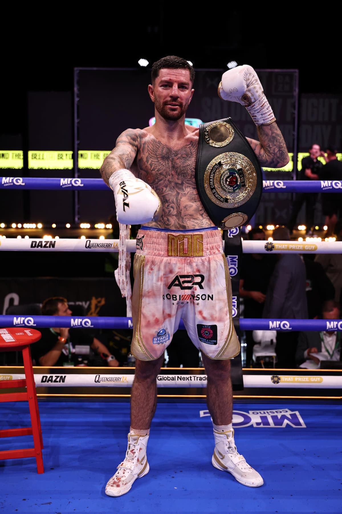 Mark Chamberlain poses with his IBO championship belt after his victory over Pierce O'Leary