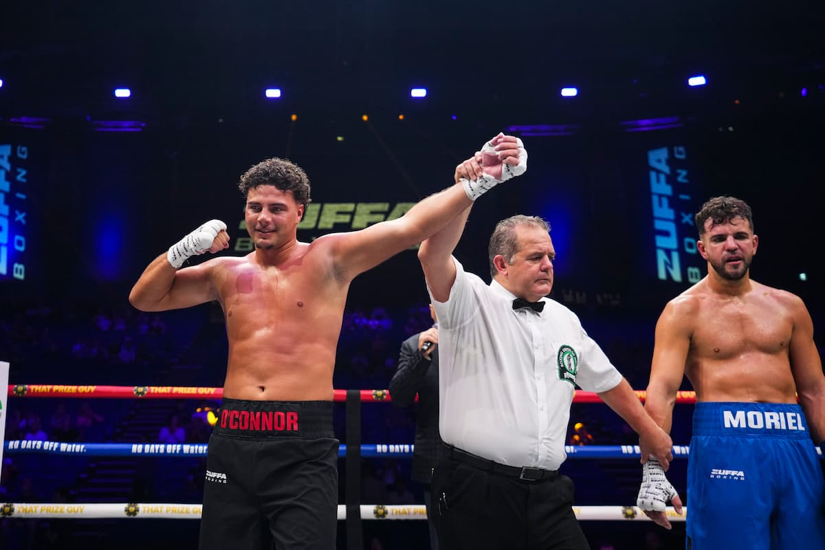 Patrick O'Connor has his hand raised by the referee after his victory over Juan Manuel Moriel