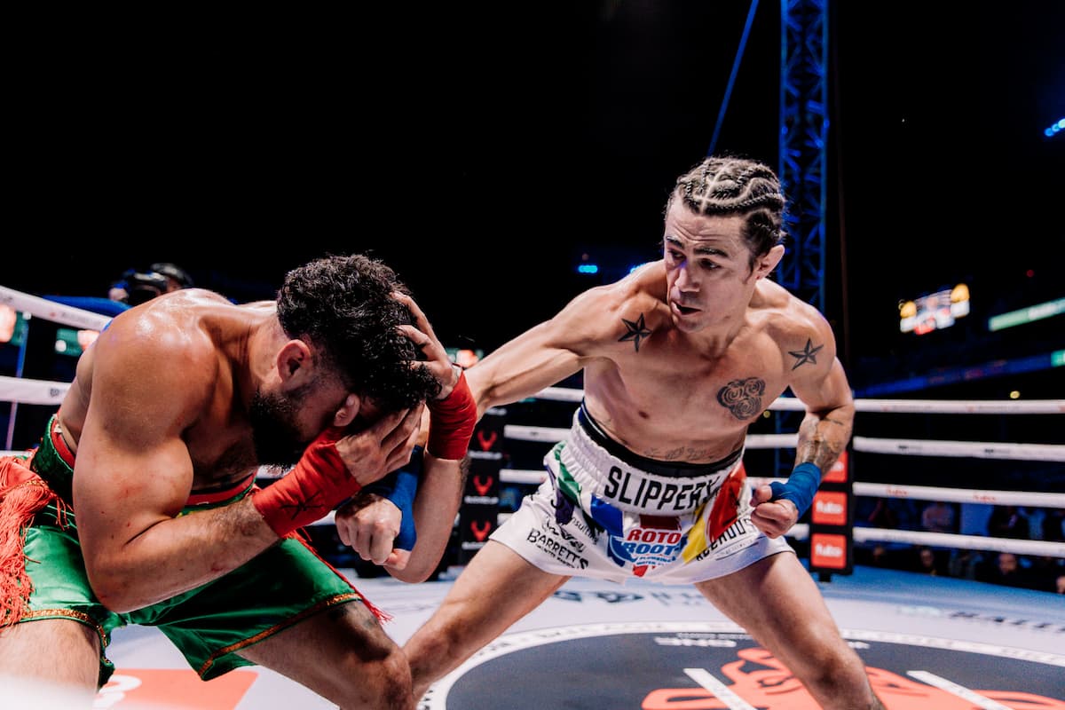 Peter Barrett lands a punch during his bout against Elijah Harris