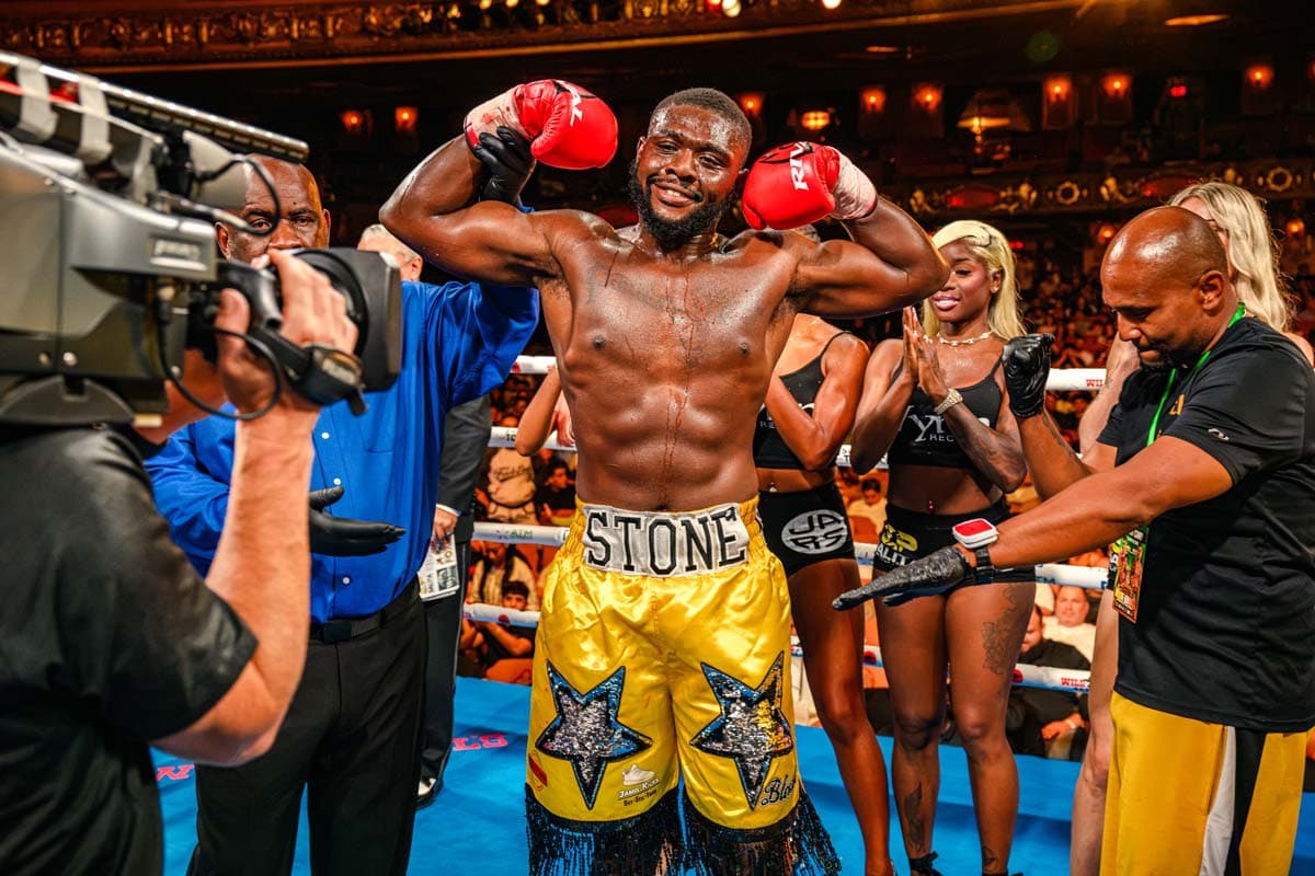Sardius Simmons poses after his victory over Detrailous Webster