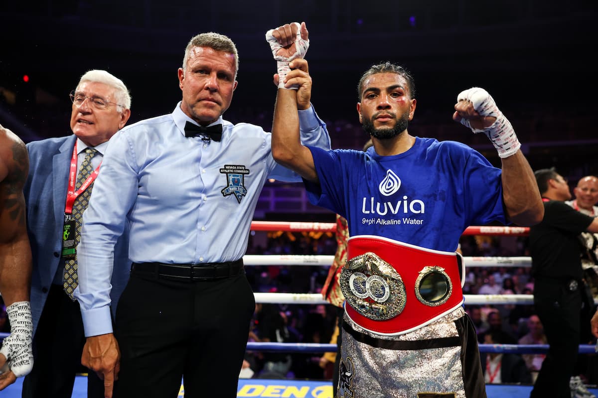 Raymond Muratalla has his hand raised by referee Thomas Taylor in victory over Robson Conceicao