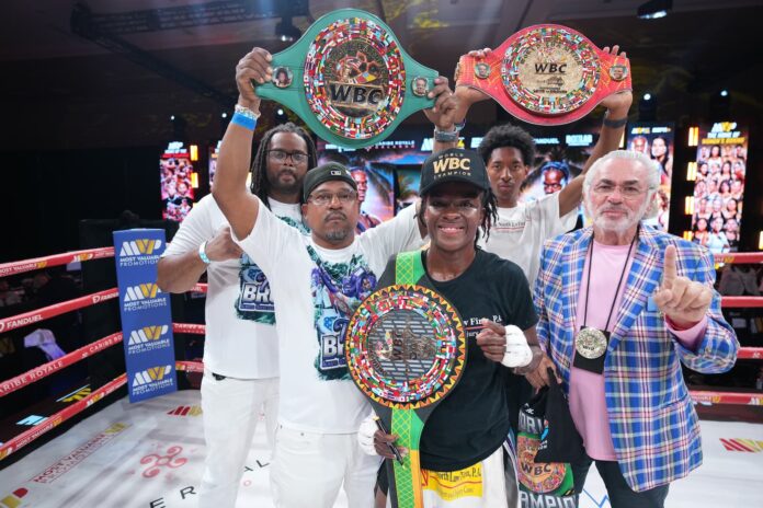Tiara Brown with her team after her victory over Hannah Rapp
