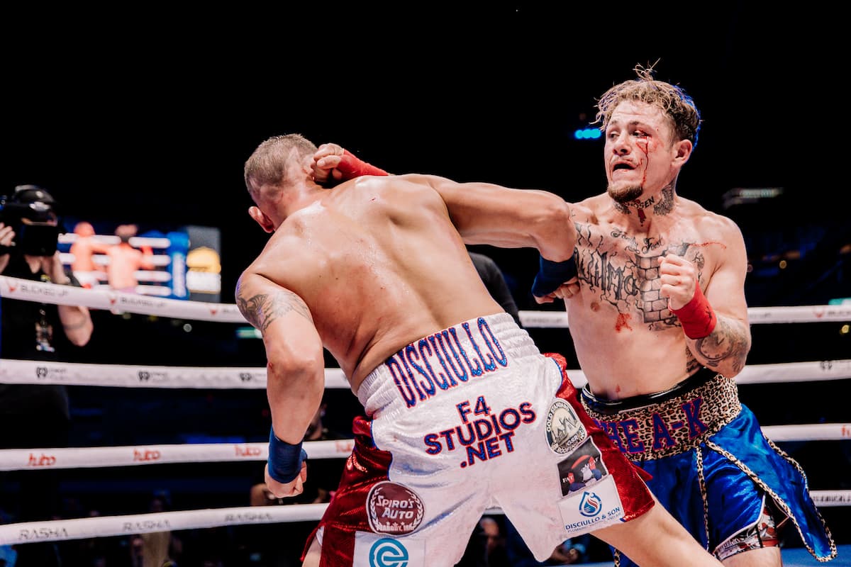 Tray Martin lands a punch during his bout against Rico Disciullo