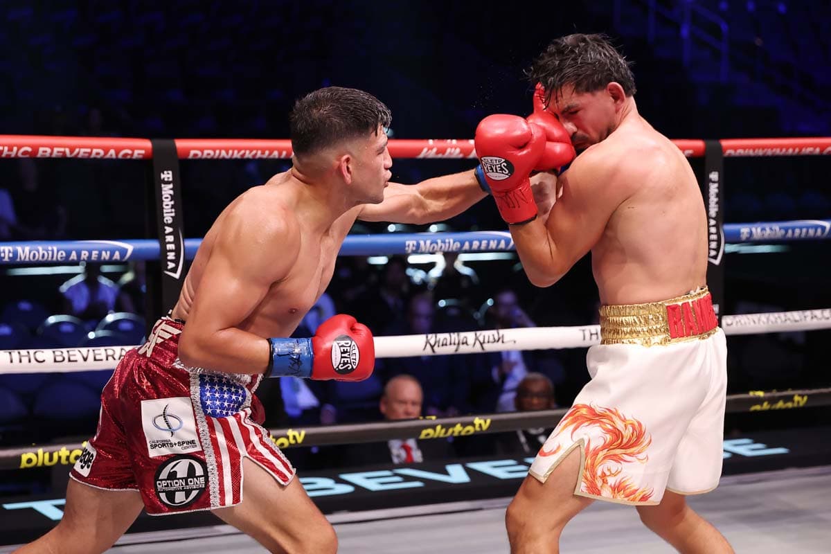 Alexis Rocha lands a punch during his bout against Jose Ramirez