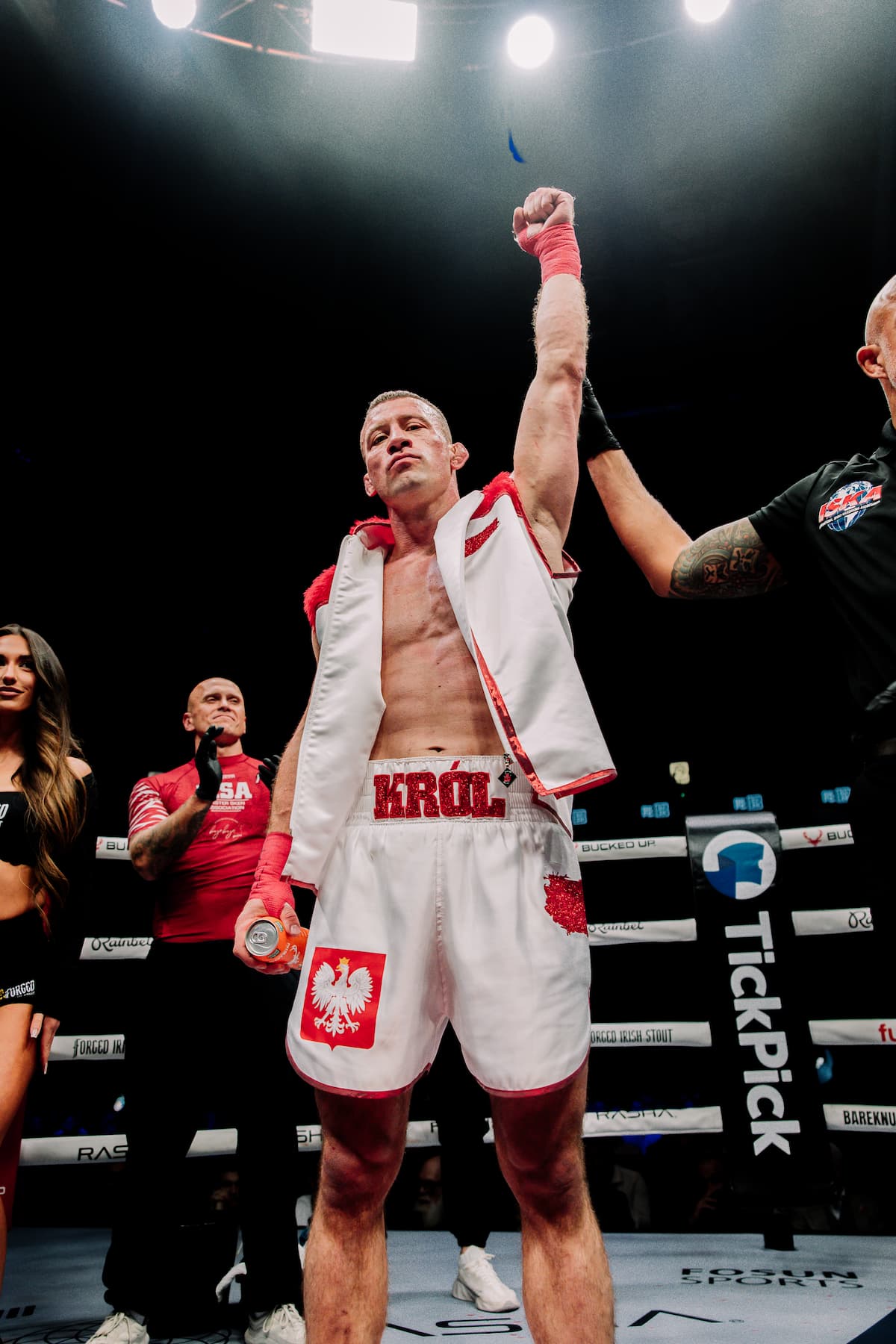 Bartlomiej Krol has his hand raised in victory after defeating Luke Vaughan