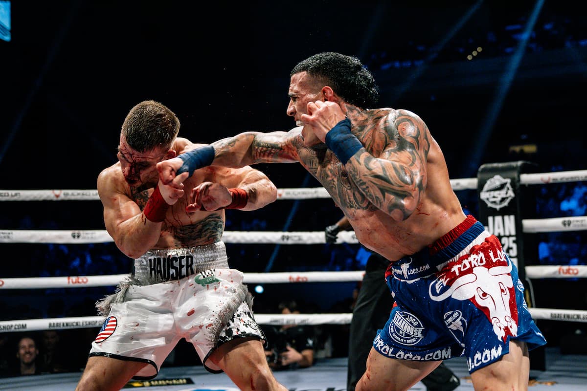 Ernesto Suarez lands a punch during his bout against Ronny Hauser