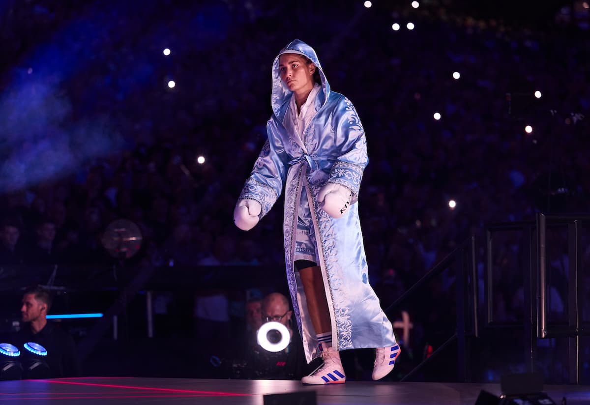Flora Pili makes her ring walk ahead of her bout against Katie Taylor
