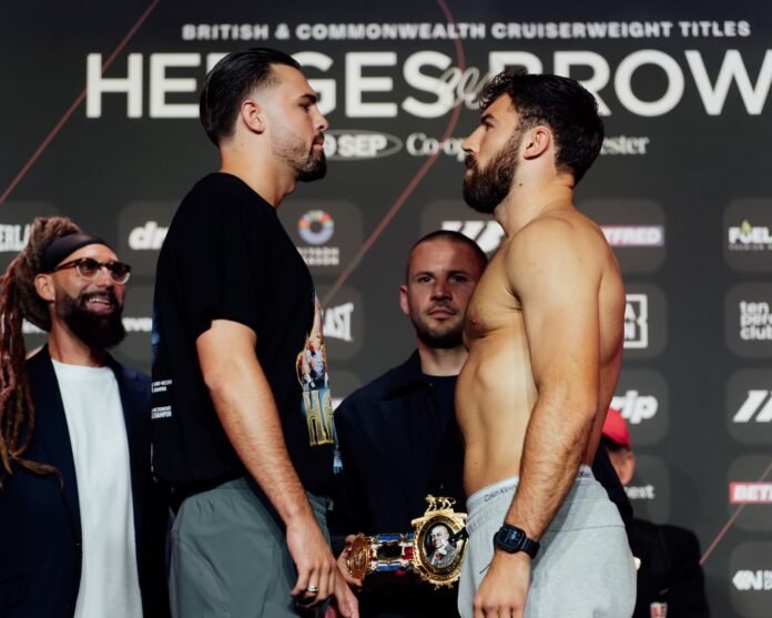 John Hedges and Pat Brown face off during the weigh-in ahead of their boxing bout