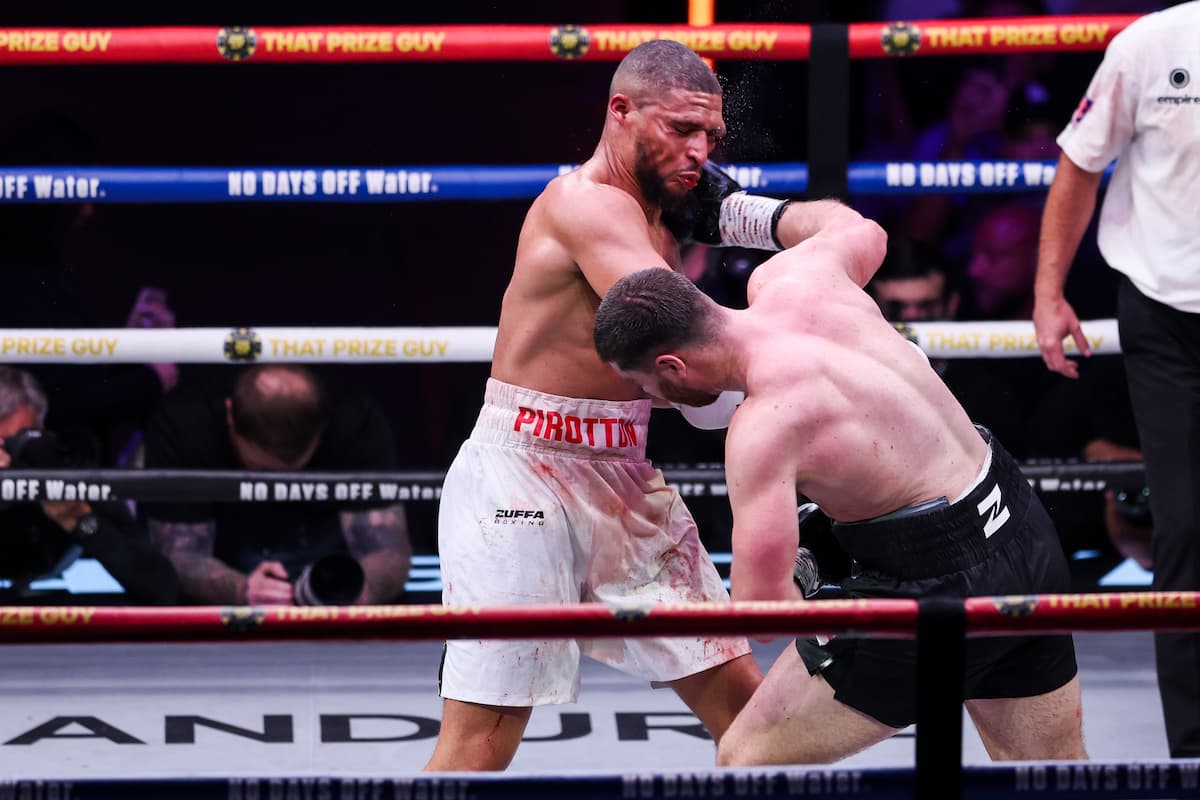 Johnny Fisher lands a punch during his bout against Michael Pirotton