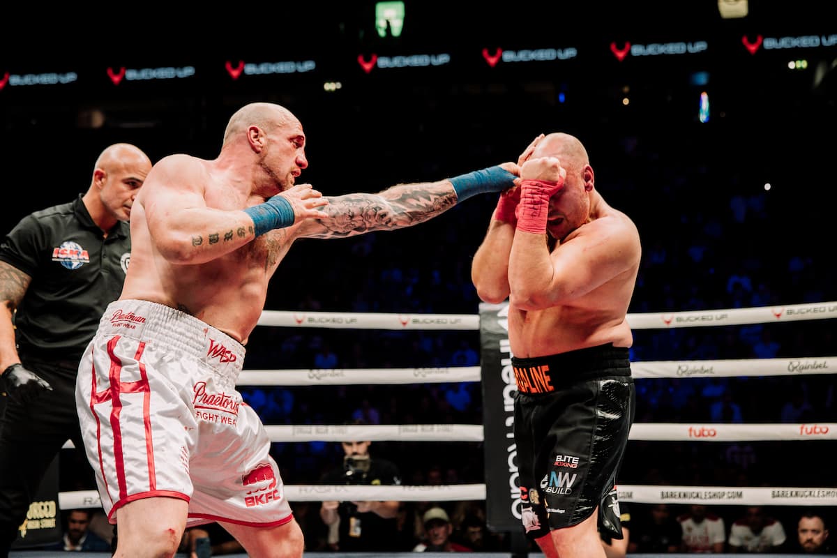 Karl Thompson lands a jab during his bout against Andy Thornton