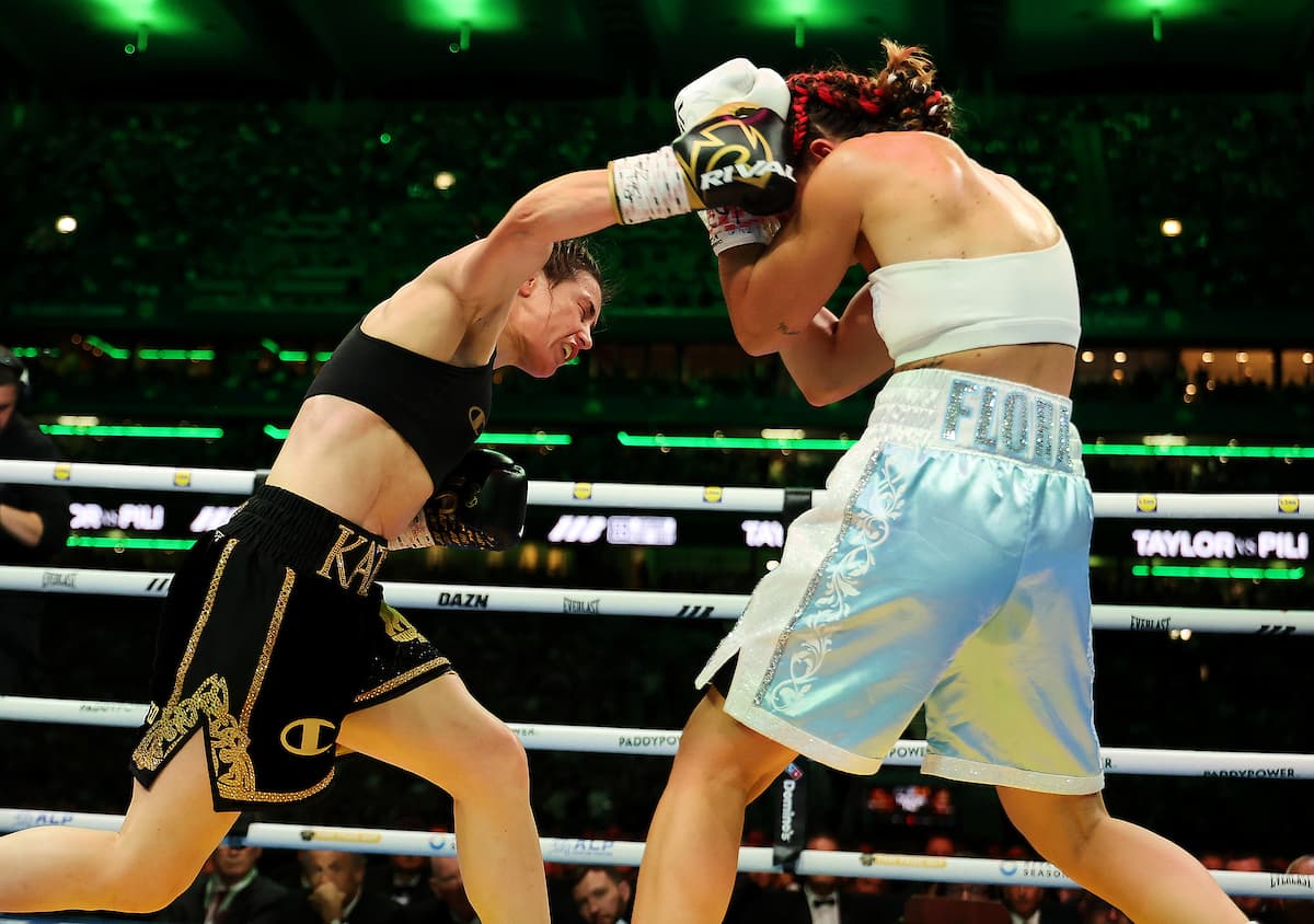 Katie Taylor lands an overhand right during her bout against Flora Pili