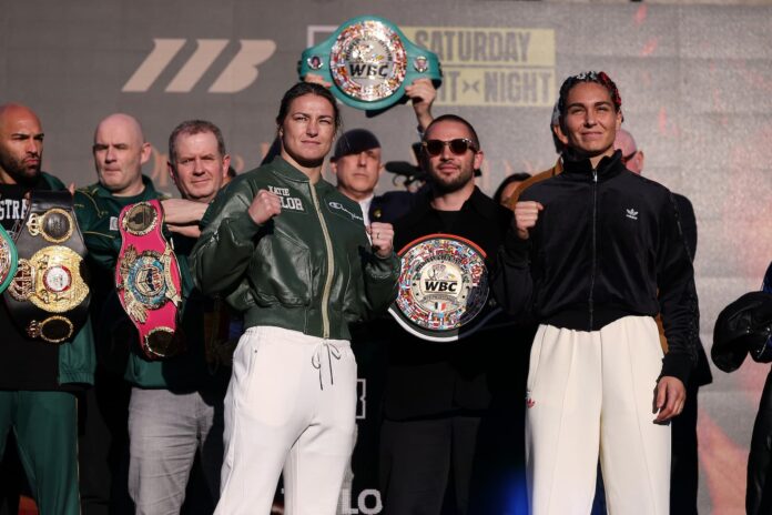 Katie Taylor and Flora Pili face off during the weigh-in ahead of their boxing bout