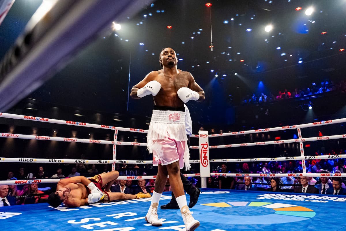 Keven Beausejour walks away as Leonel Silva Salas lies on the canvas