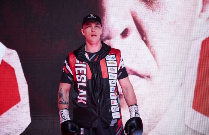 Michal Cieslak makes his ring walk ahead of his bout