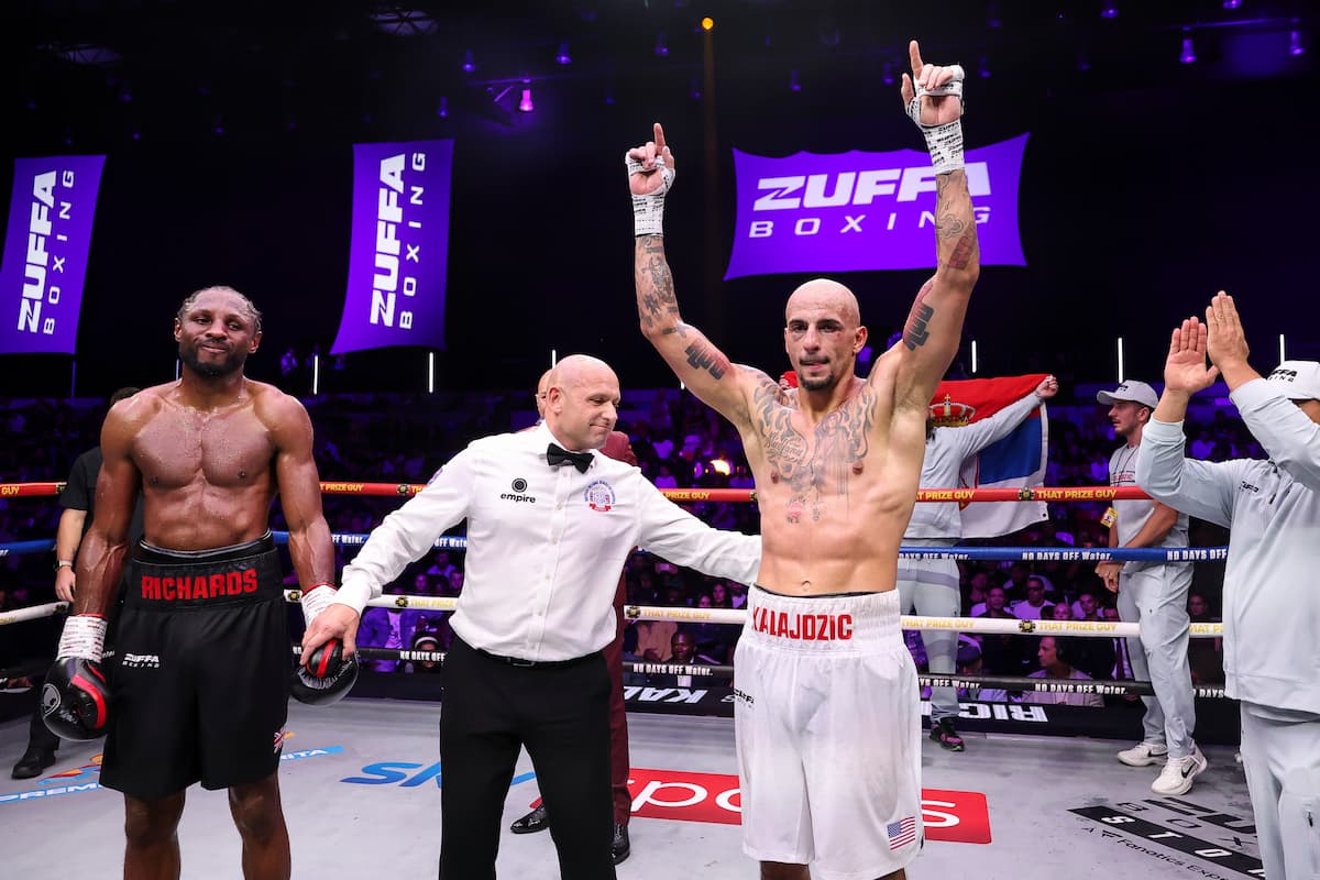 Radivoje Kalajdzic has his hand raised in victory after defeating Craig Richards