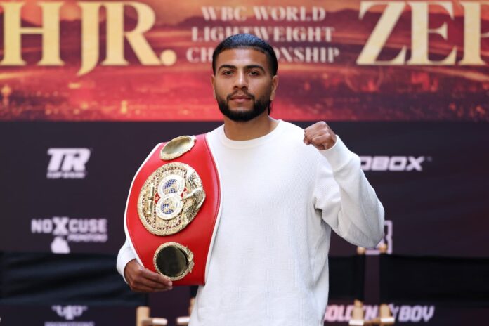 Raymond Muratalla poses with his IBF championship belt during the press conference
