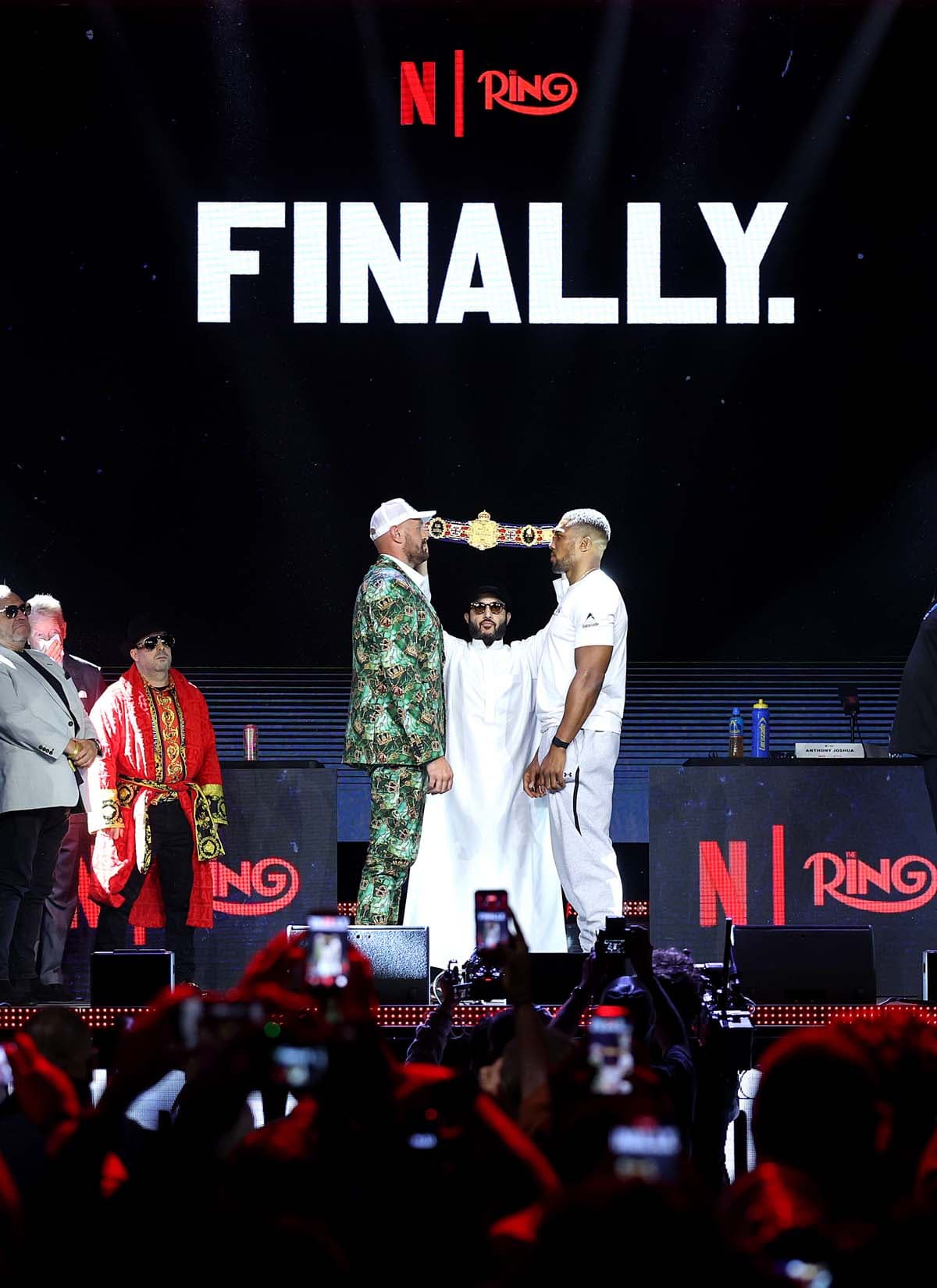 Tyson Fury and Anthony Joshua face off during the press conference in London