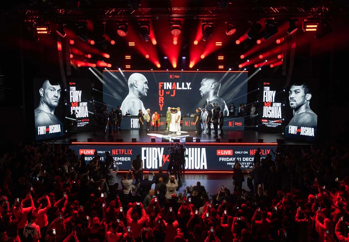 Tyson Fury and Anthony Joshua face off during the press conference in London