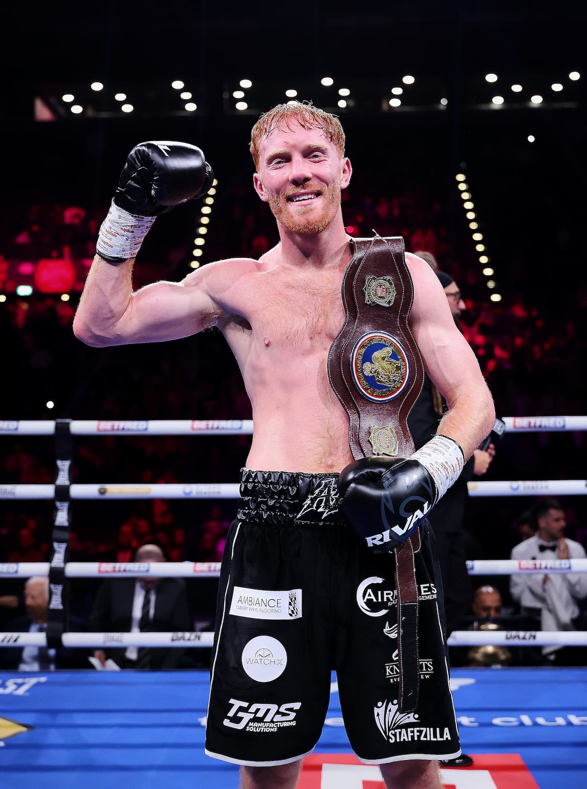 Aaron Bowen poses with his championship belt following his victory over Klinton Baptiste