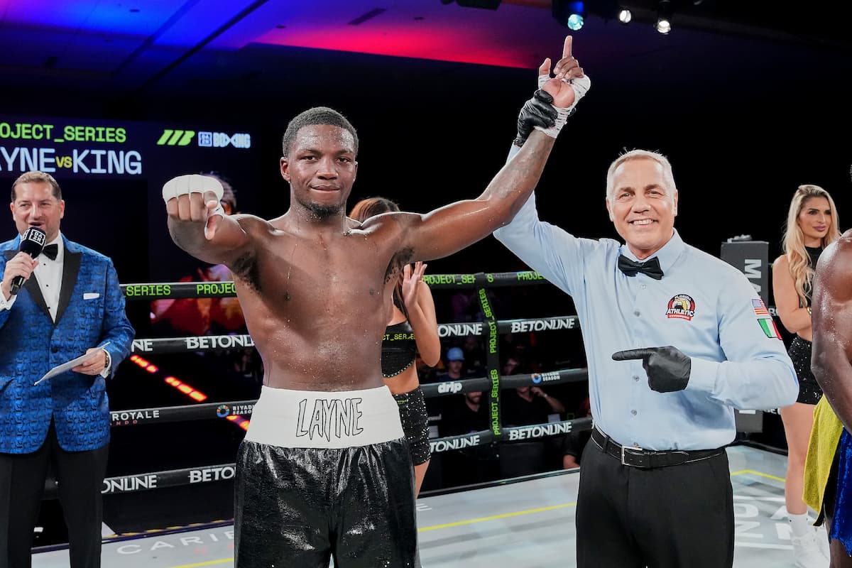 Donte Layne has his hand raised by referee Massimo Montanini in victory over Keithland King