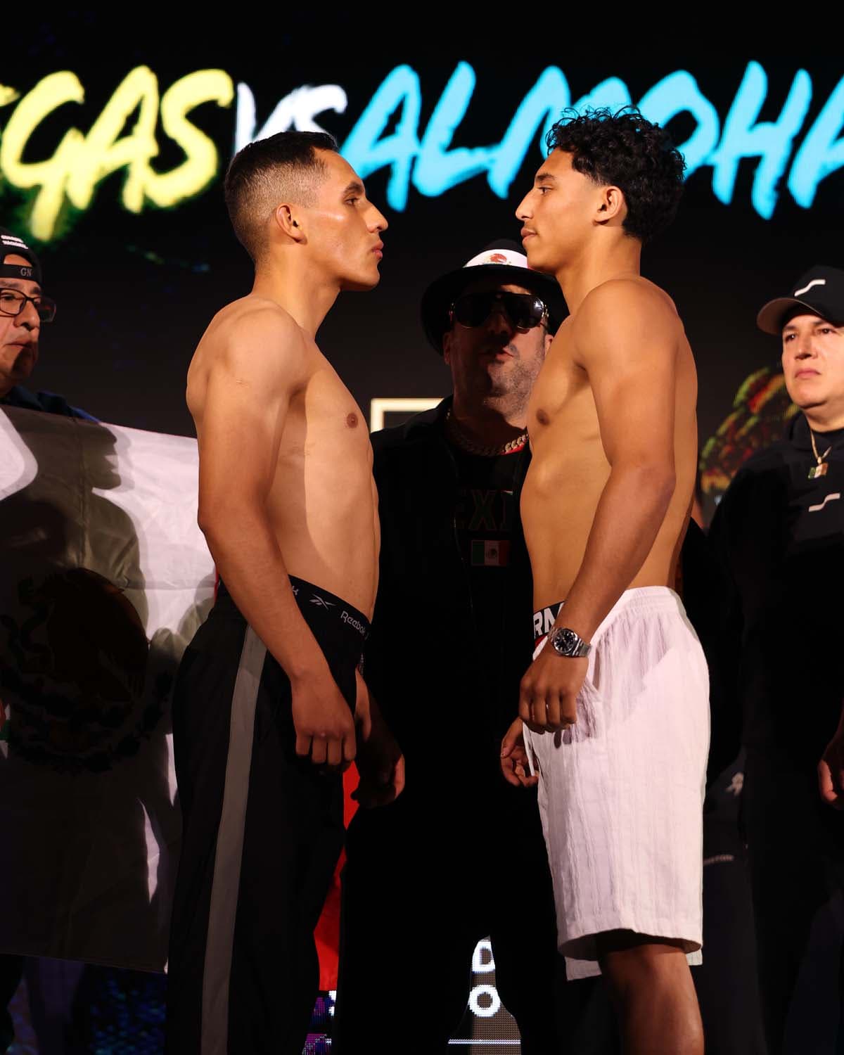 Erick Jahir Urvina Villegas and Sultan Almohammed face off during the weigh-in