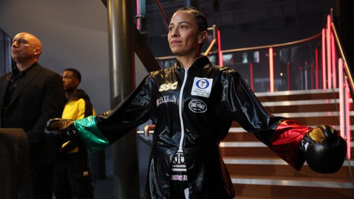 Irma Garcia makes her ring walk before her bout against Emma Dolan
