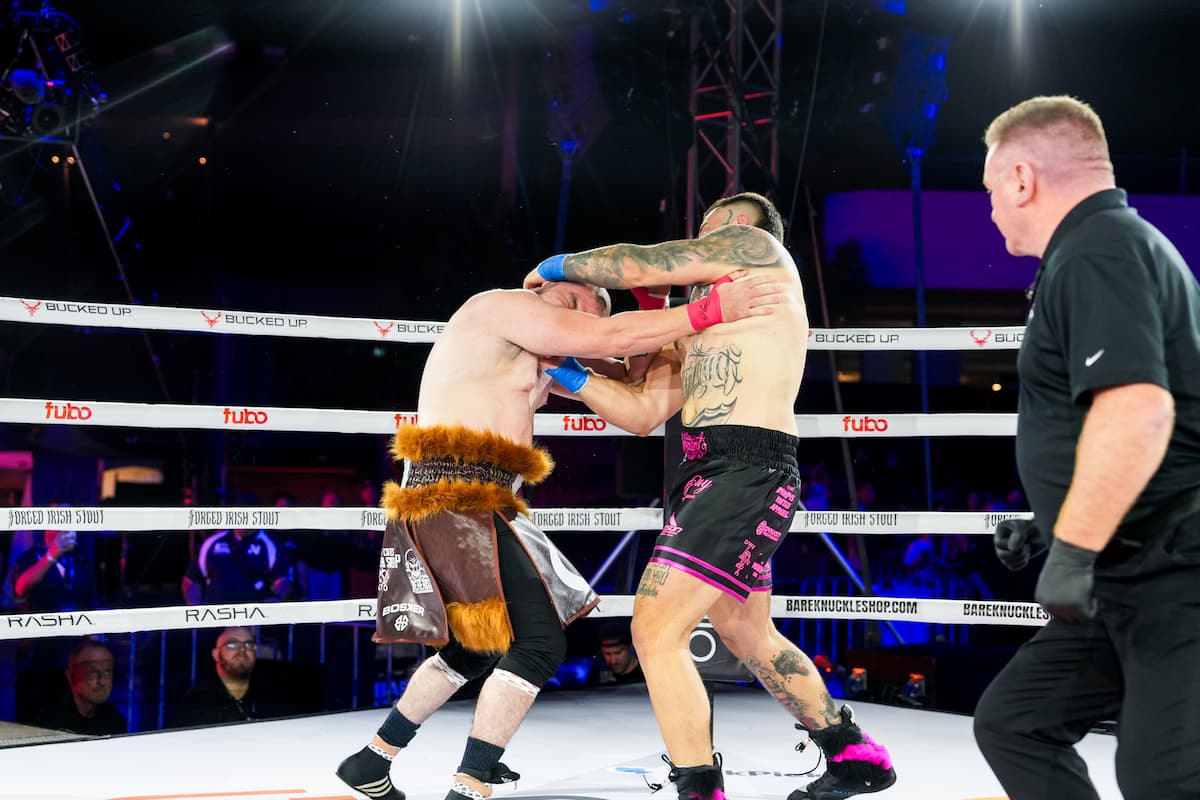 Mel Tolone lands an uppercut during his bout against Ricky Rowles-Brown