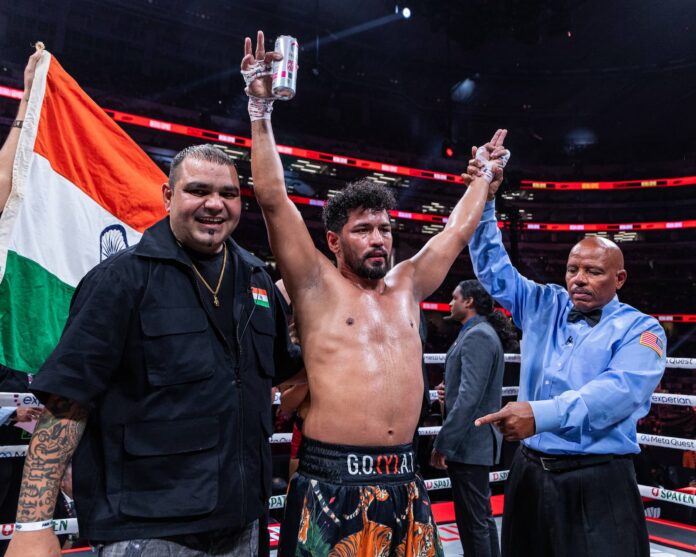 Neeraj Goyat has his hand raised by the referee in victory over Whindersson Nunes